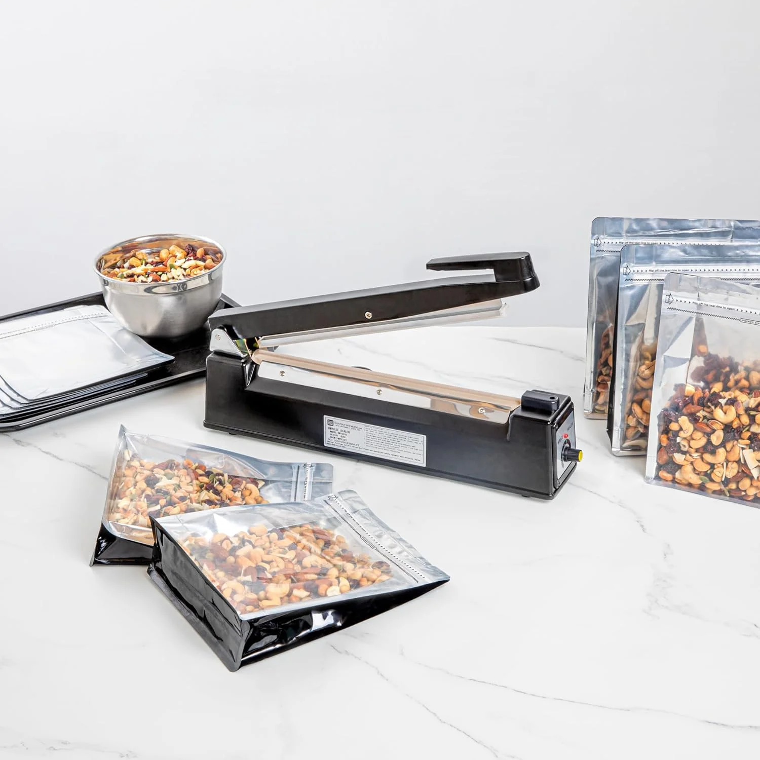 دستگاه پرس حرارتی دستی Restaurantware، دستگاه پلمپ کیسه ای ضربه ای - 12 اینچ مشکی به همراه المنت حرارتی اضافی، بسته 1 عددی Restaurantware دستگاه پرس حرارتی دستی Restaurantware، دستگاه پلمپ کیسه ای ضربه ای - 12 اینچ مشکی به همراه المنت حرارتی اضافی، بسته 1 عددی Restaurantware