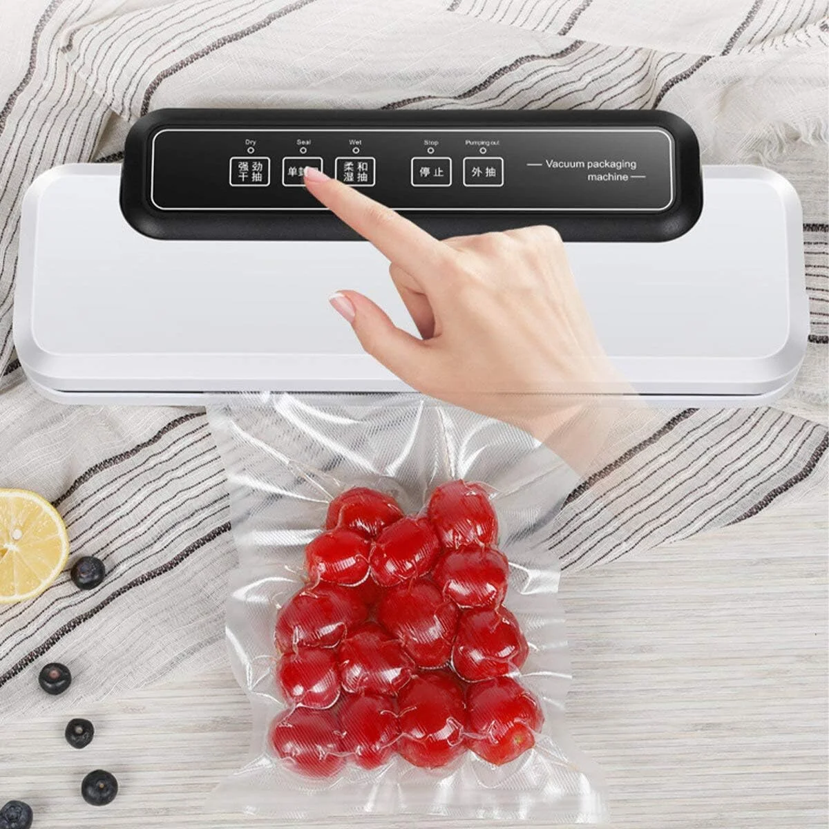 دستگاه بسته بندی وکیوم مواد غذایی اتوماتیک TTGLRT به همراه 10 عدد کیسه