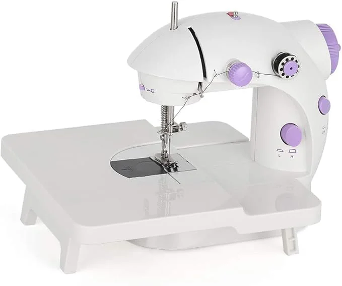 چرخ خیاطی کوچک قابل حمل | چرخ خیاطی برقی دستی با میز کمکی و کنترل 2 سرعته - استفاده آسان برای کودکان، مبتدیان و مصارف خانگی (بنفش) چرخ خیاطی کوچک قابل حمل | چرخ خیاطی برقی دستی با میز کمکی و کنترل 2 سرعته - استفاده آسان برای کودکان، مبتدیان و مصارف خانگی (بنفش)