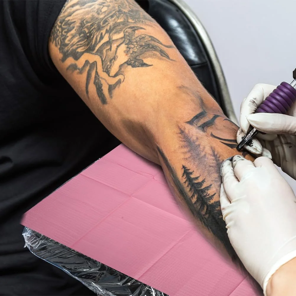 پیشبند یکبار مصرف دندانپزشکی، ورقه‌های پیشبند چند منظوره، پارچه‌های بهداشتی، زیرانداز شخصی، روکش میز تاتو، پد تمیز کننده، پارچه‌های ضد آب با جذب بالا، پارچه‌های پزشکی قابل حمل برای مطب دندانپزشکی