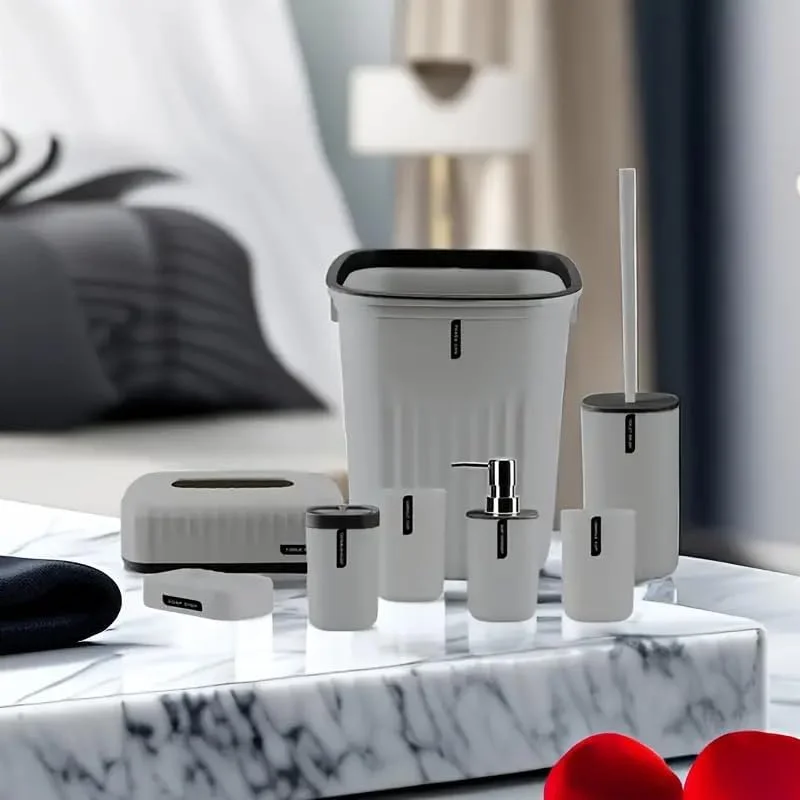ست لوازم جانبی حمام 8 تکه شامل جای صابون، مایع دستشویی، جا مسواکی، سطل زباله، جعبه دستمال کاغذی، برس توالت، 2 لیوان مسواک، ست هدیه لوازم جانبی دکور حمام (خاکستری)