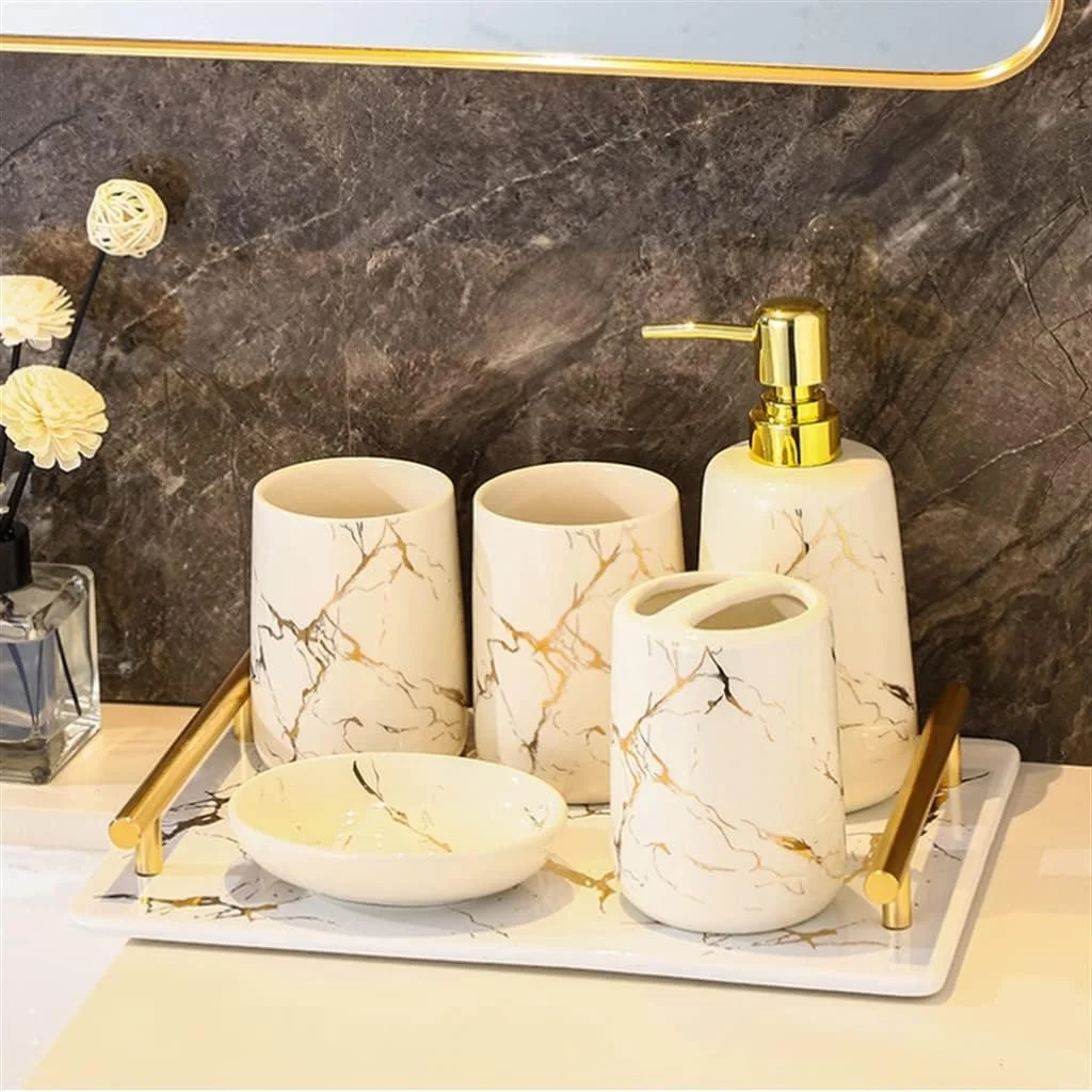 ست پنج تکه لوازم بهداشتی حمام، شامل جا مسواکی و لیوان دهانشویه