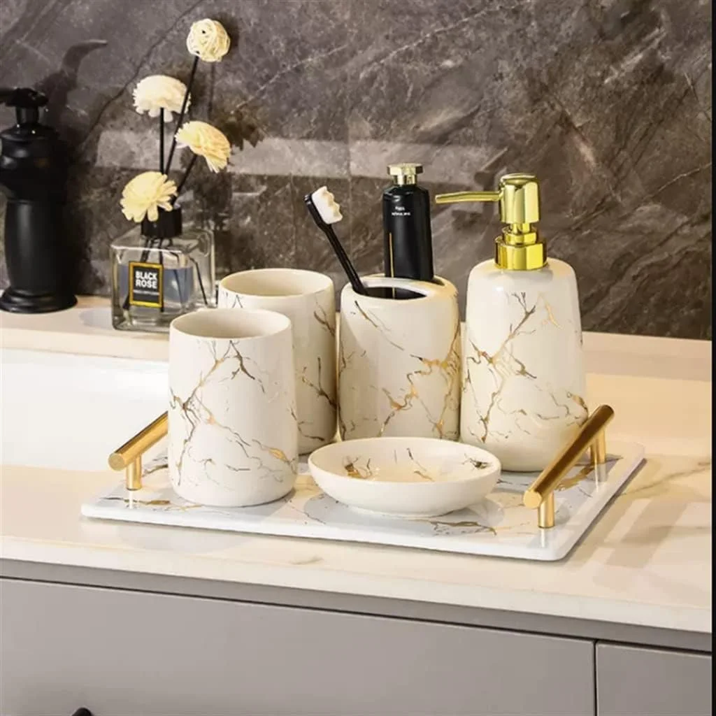 ست پنج تکه لوازم بهداشتی حمام، شامل جا مسواکی و لیوان دهانشویه