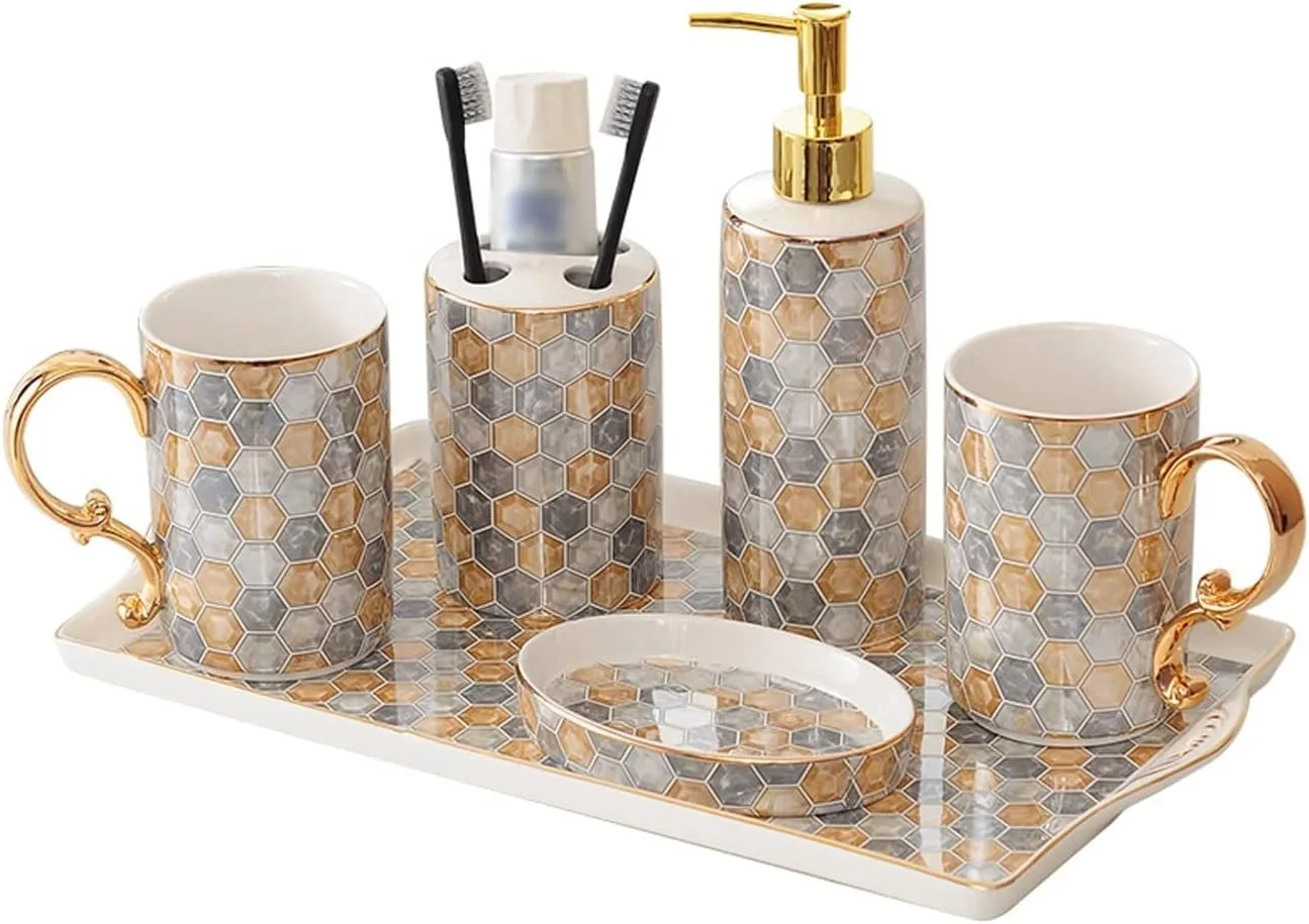 ست لوازم سرامیکی حمام شامل جا مایع دستشویی، جا مسواکی، دو عدد لیوان و جا صابونی به همراه سینی ست لوازم سرامیکی حمام شامل جا مایع دستشویی، جا مسواکی، دو عدد لیوان و جا صابونی به همراه سینی