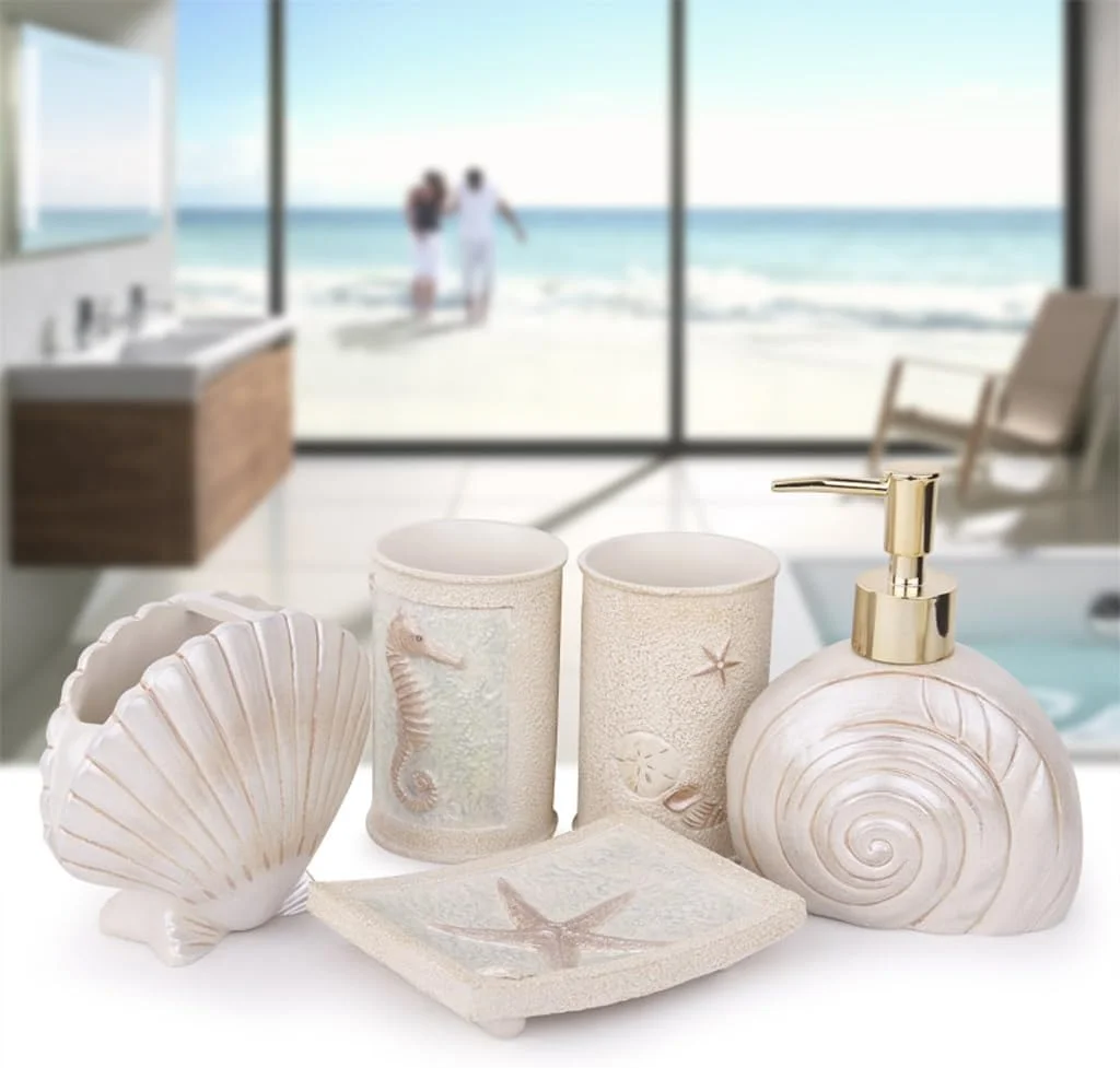 ست پنج تکه لوازم بهداشتی سرامیکی برای حمام، شامل جا مسواکی، لیوان دهانشویه، جای مایع دستشویی و جا صابونی