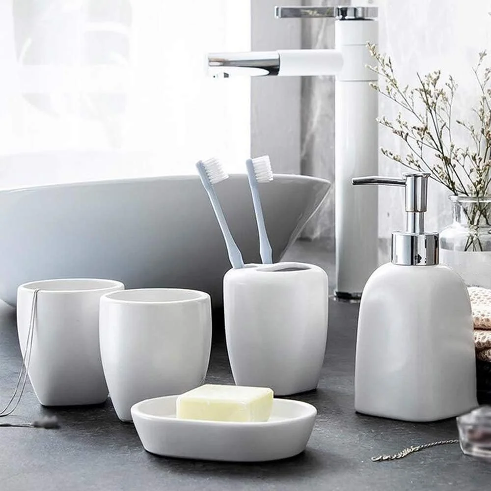 ست لوازم جانبی حمام سرامیکی سفید - شامل 5 تکه، شامل جا مایع صابون، جا مسواکی، لیوان دهانشویه، جا صابونی، مجموعه ست حمام شیک