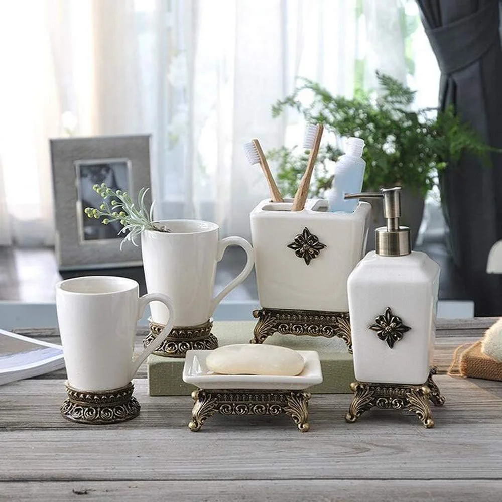 ست لوازم جانبی سرامیکی 5 تکه حمام شامل جای مایع صابون، جا مسواکی، لیوان و جا صابونی