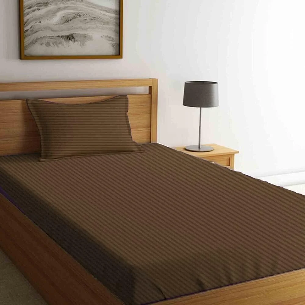 ملحفه کش دار یک نفره و روبالشتی طرح لاله (قهوه ای تیره) با راه راه ساتن 1 سانتی متری (ست 2 تکه) 100% پنبه، ملحفه نرم و با کیفیت هتل - 300 تراکم ملحفه کش دار یک نفره و روبالشتی طرح لاله (قهوه ای تیره) با راه راه ساتن 1 سانتی متری (ست 2 تکه) 100% پنبه، ملحفه نرم و با کیفیت هتل - 300 تراکم