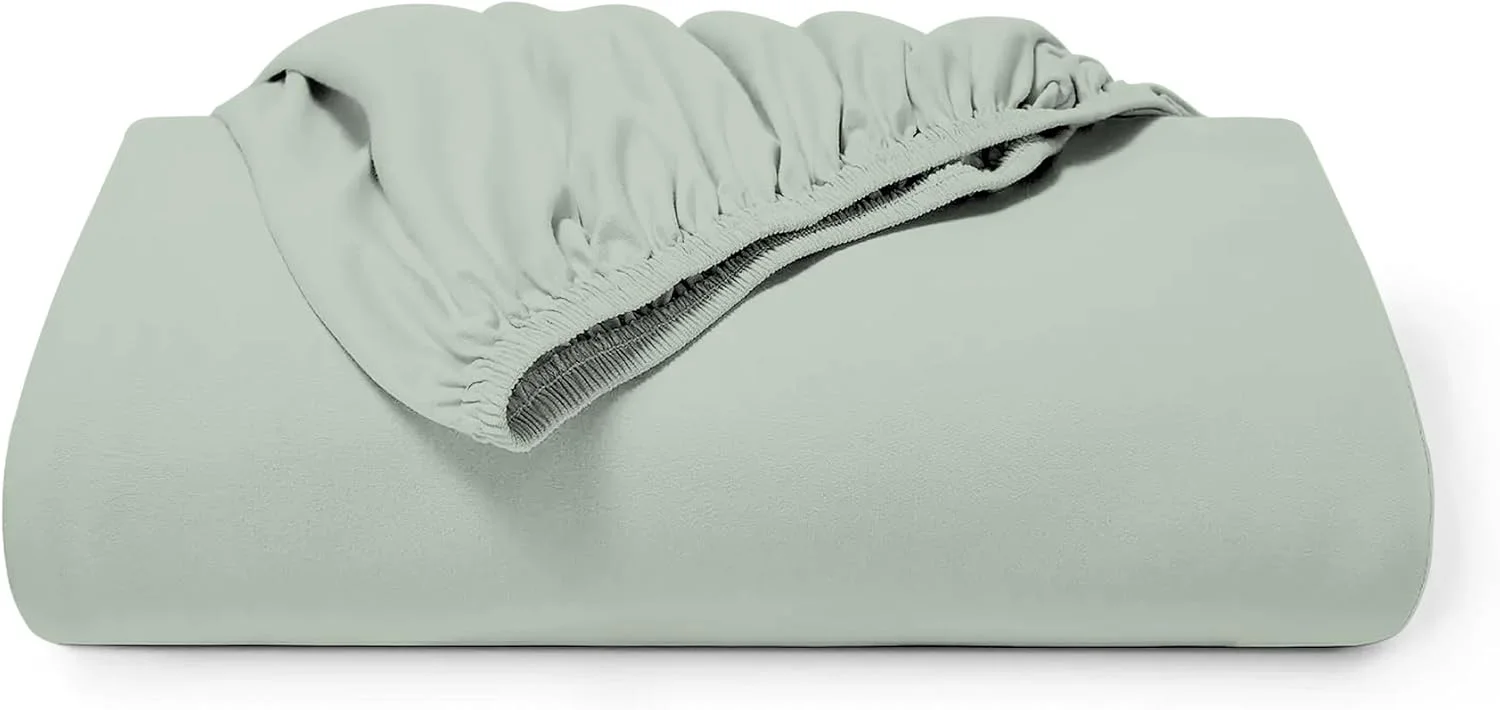 ملحفه کش‌دار پنبه‌ای مناسب تخت یک نفره ۹۰x۲۰۰ سانتی‌متر - سبز ملایم، جیب عمیق ۳۰ سانتی‌متری مناسب تشک ضخیم، پارچه پرکال نرم، خنک و تنفس‌پذیر، ایده‌آل برای آب و هوای گرم، نگهداری آسان و بادوام