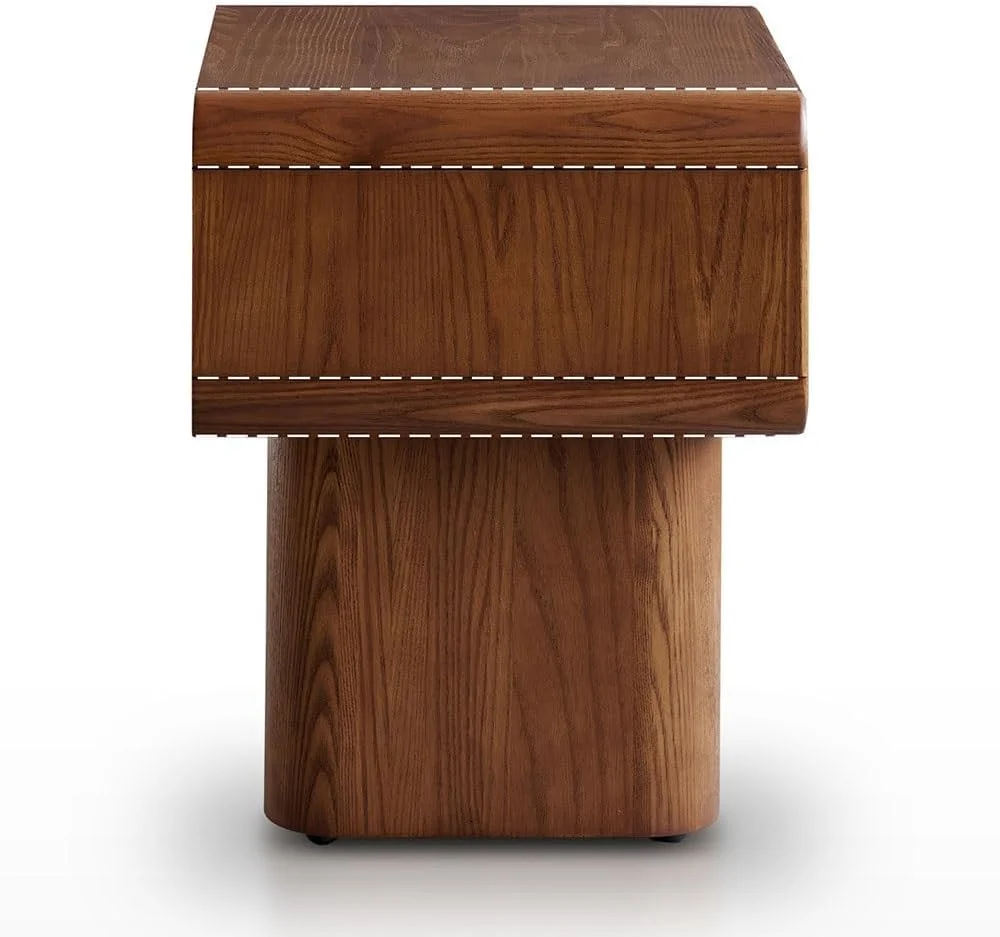 میز کنار تختی با طراحی هندسی دایره ای قدیمی، دارای کشو و پایه های عمودی تخت ضخیم میز کنار تختی با طراحی هندسی دایره ای قدیمی، دارای کشو و پایه های عمودی تخت ضخیم