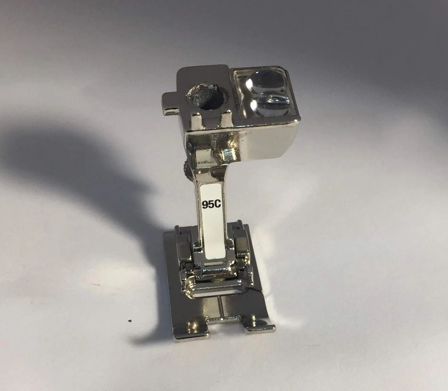 پایه لب تا کن مدل قدیمی #95C مناسب برای چرخ خیاطی های برنینا: گروه A - 910, 930, 931, 932, 933, 940, 950, 1000, 1000+, 1001, 1004, 1005, 1006, 1008, 1010, 1011, 1015, 1020, 1021, 1030, 1031, 1050 Holidaynu, 1070, 1080, 1090, 1120, 1130, 1230, 1240, 1260, 1530, 1630 گروه H - 820, 830 مدل ها - 530, 532, 534, 540, 600, 610, 640 (نه Artista 640), 644, 700, 707, 708, 709, 717, 718, 719, 730 (نه Artista 730), 731, 732, 740, 741, 742, 800, 801S, 802S, 803S, 807, 808, 809, 810, 811, 817, 818, 819, 831, 832, 841, 842, 850, 900 پایه لب تا کن مدل قدیمی #95C مناسب برای چرخ خیاطی های برنینا: گروه A - 910, 930, 931, 932, 933, 940, 950, 1000, 1000+, 1001, 1004, 1005, 1006, 1008, 1010, 1011, 1015, 1020, 1021, 1030, 1031, 1050 Holidaynu, 1070, 1080, 1090, 1120, 1130, 1230, 1240, 1260, 1530, 1630 گروه H - 820, 830 مدل ها - 530, 532, 534, 540, 600, 610, 640 (نه Artista 640), 644, 700, 707, 708, 709, 717, 718, 719, 730 (نه Artista 730), 731, 732, 740, 741, 742, 800, 801S, 802S, 803S, 807, 808, 809, 810, 811, 817, 818, 819, 831, 832, 841, 842, 850, 900