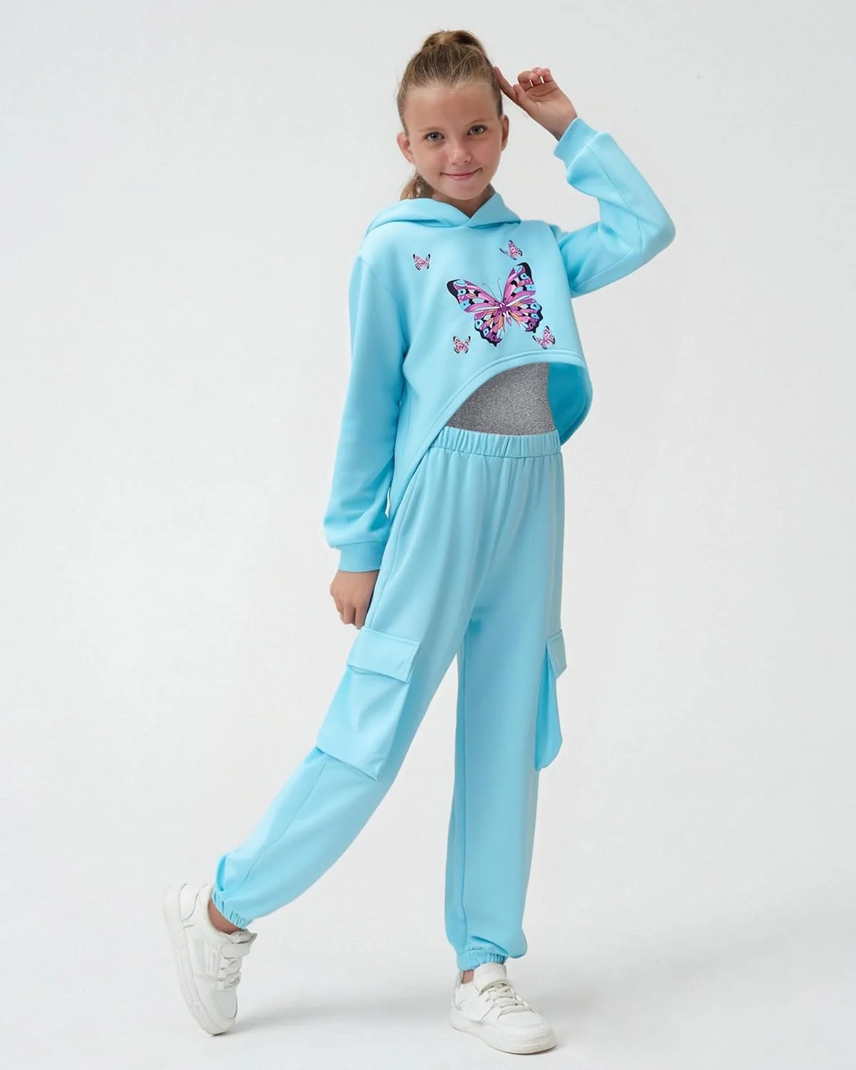 ست لباس ۳ تکه دخترانه شامل تاپ نیم تنه، شلوار گرمکن و هودی آستین بلند مناسب ۷ تا ۱۴ سال