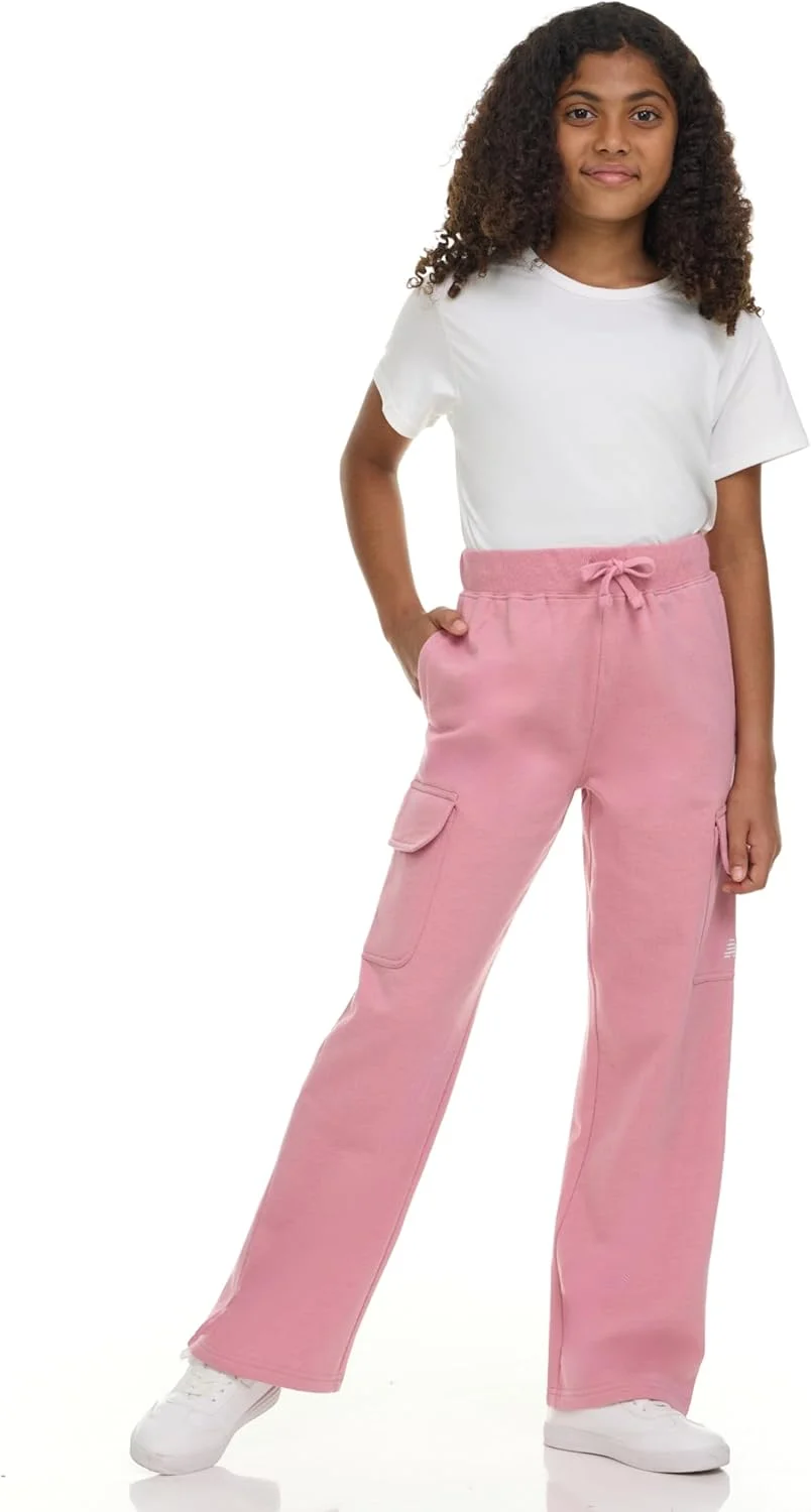 شلوار گرمکن دخترانه نیو بالانس مدل کارگو – ترکیب پنبه‌ای نرم و پشمی، مدل کشی با پاچه گشاد و دمپا باز و بند دار، سایز 4 تا 16