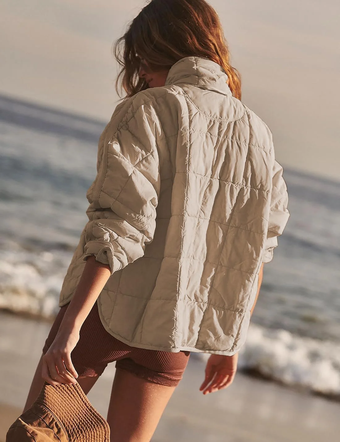 کاپشن پفی کوتاه زنانه، سبک وزن، آستین بلند، زیپ دار و قابل جمع شدن