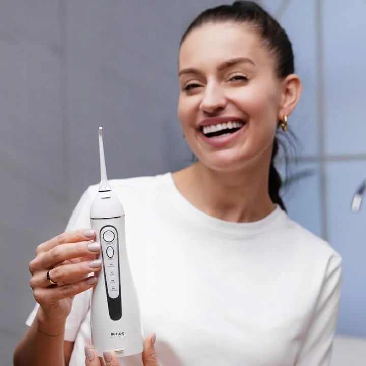 دستگاه تمیز کننده دندان بی سیم با 4 حالت و 2 نازل سفید 150 میلی لیتر