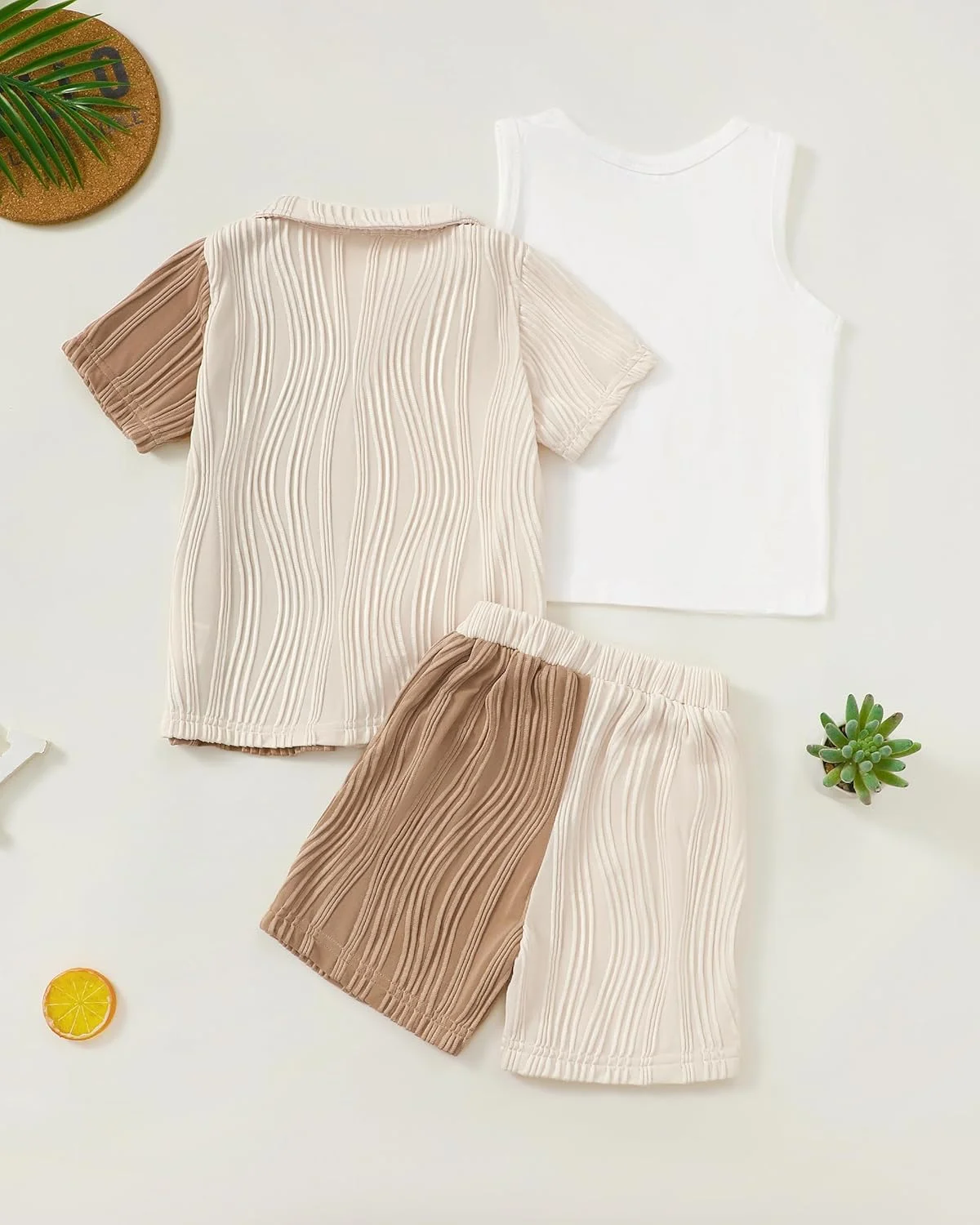 ست لباس تابستانی پسرانه شامل پیراهن آستین کوتاه دکمه دار، شلوارک و جلیقه