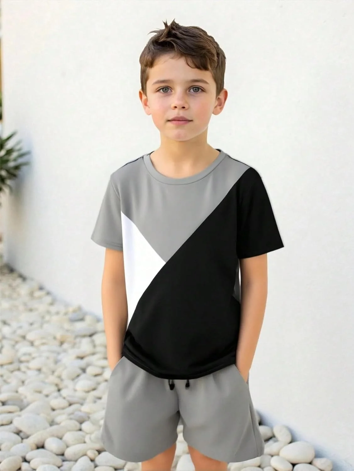 ست لباس تابستانی پسرانه شامل تیشرت رنگی و شلوارک با بند