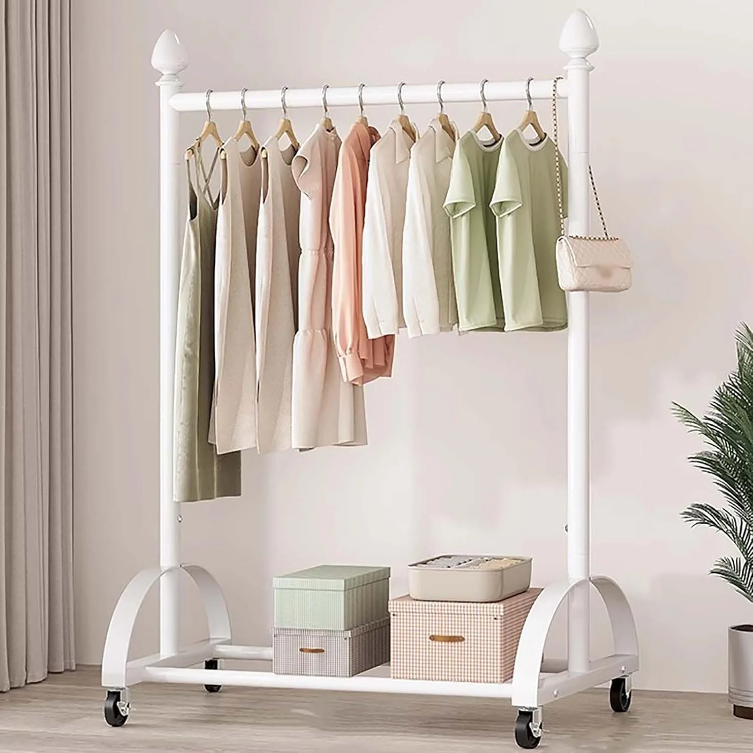 رگال لباس ساده و چندمنظوره با چرخ و قاب فلزی، دارای قفسه و قلاب برای نگهداری کت/کلاه، راهکاری برای نمایش لباس (سفید - 100 سانتی متر) رگال لباس ساده و چندمنظوره با چرخ و قاب فلزی، دارای قفسه و قلاب برای نگهداری کت/کلاه، راهکاری برای نمایش لباس (سفید - 100 سانتی متر)