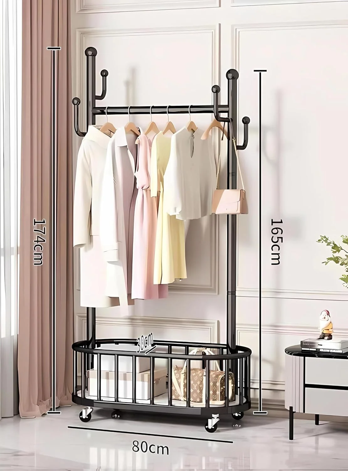 رگال لباس مشکی WEKOTEE با چرخ، رگال لباس متحرک با سبد ذخیره سازی، پایه رگال فلزی قابل حمل برای آویزان کردن لباس، رگال آویز لباس سنگین اتاق خواب، 80 سانتی متر رگال لباس مشکی WEKOTEE با چرخ، رگال لباس متحرک با سبد ذخیره سازی، پایه رگال فلزی قابل حمل برای آویزان کردن لباس، رگال آویز لباس سنگین اتاق خواب، 80 سانتی متر