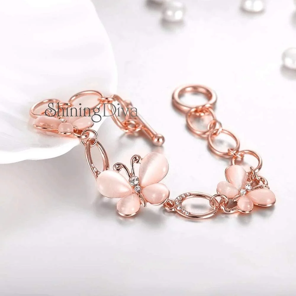 ست گوشواره و دستبند شیک و جدید زنانه و دخترانه با روکش طلای رزگلد 18 عیار ست گوشواره و دستبند شیک و جدید زنانه و دخترانه با روکش طلای رزگلد 18 عیار