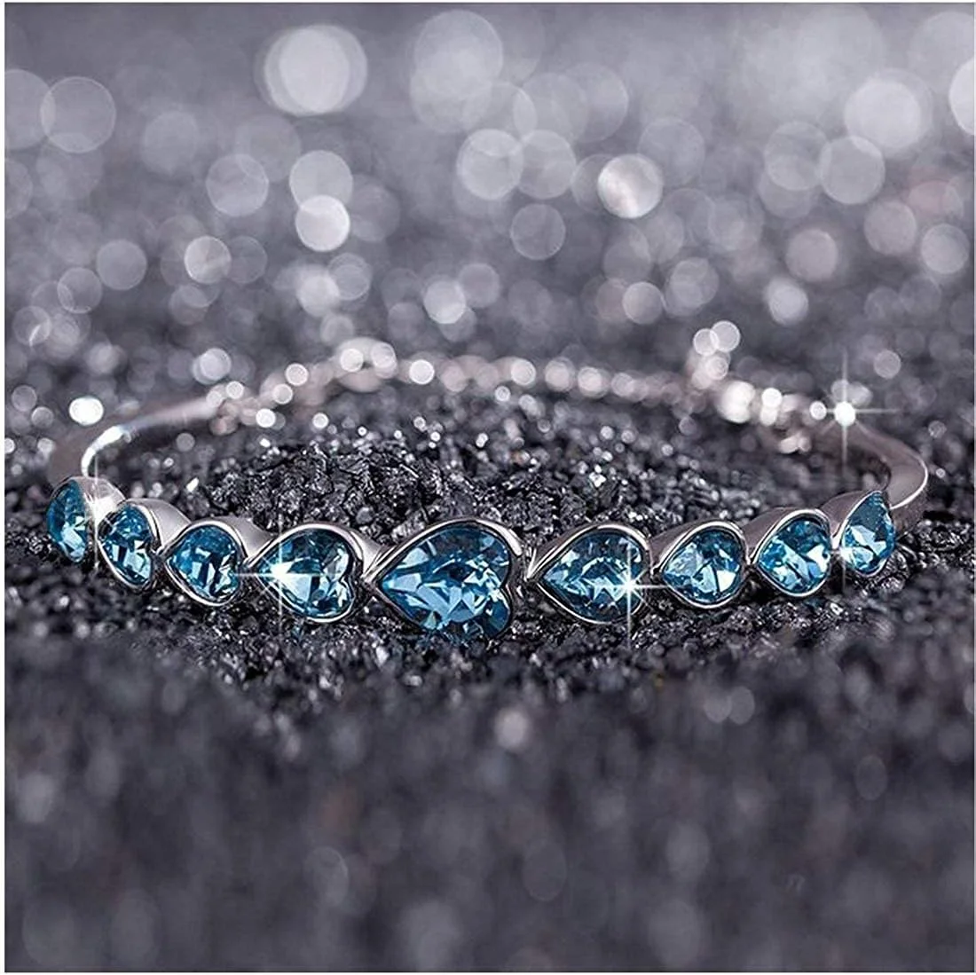 دستبند زنانه شیک و مجلسی نگین دار با روکش نقره ای و پلاتین دستبند زنانه شیک و مجلسی نگین دار با روکش نقره ای و پلاتین