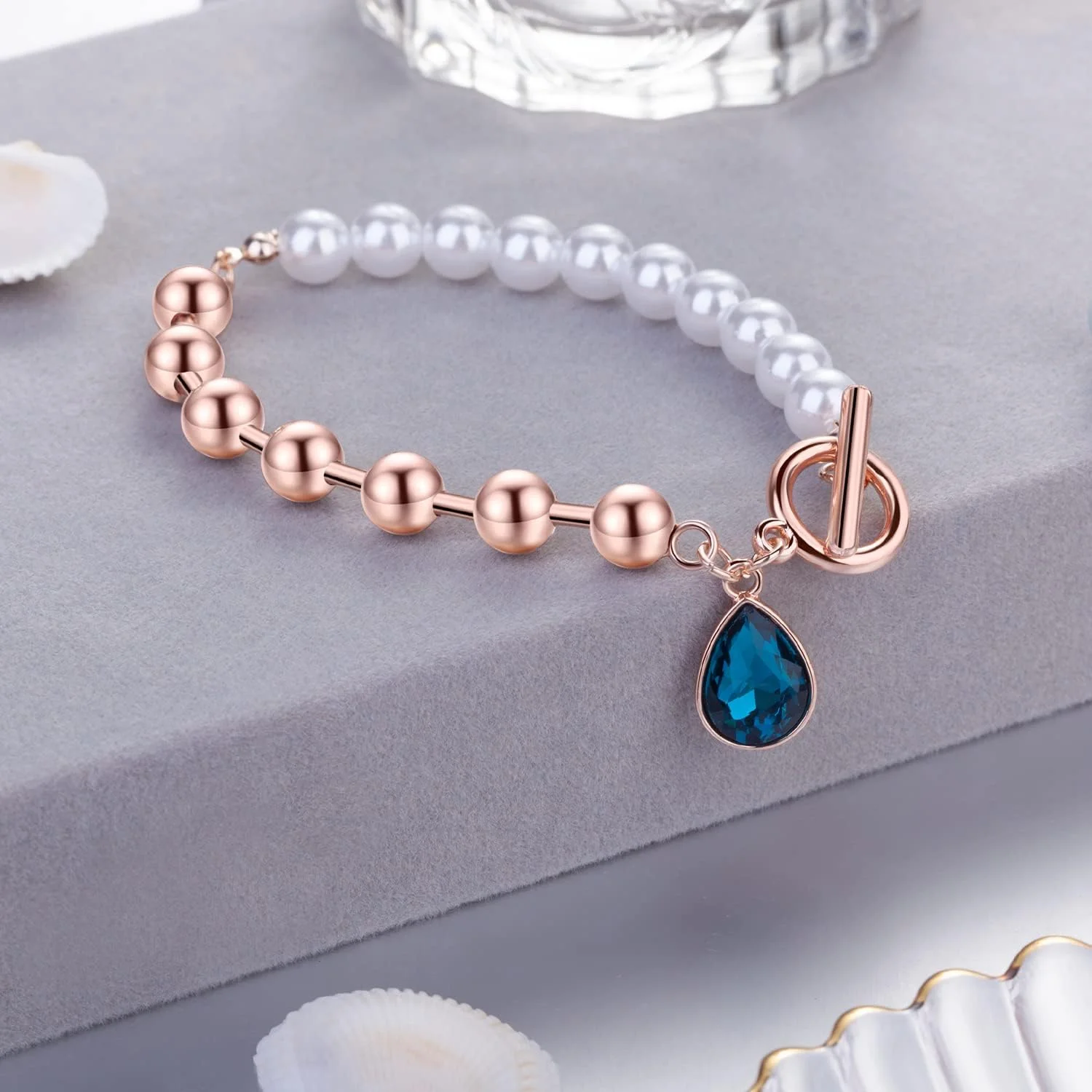 دستبند شیک و جذاب زنانه با رزگلد، مروارید و کریستال