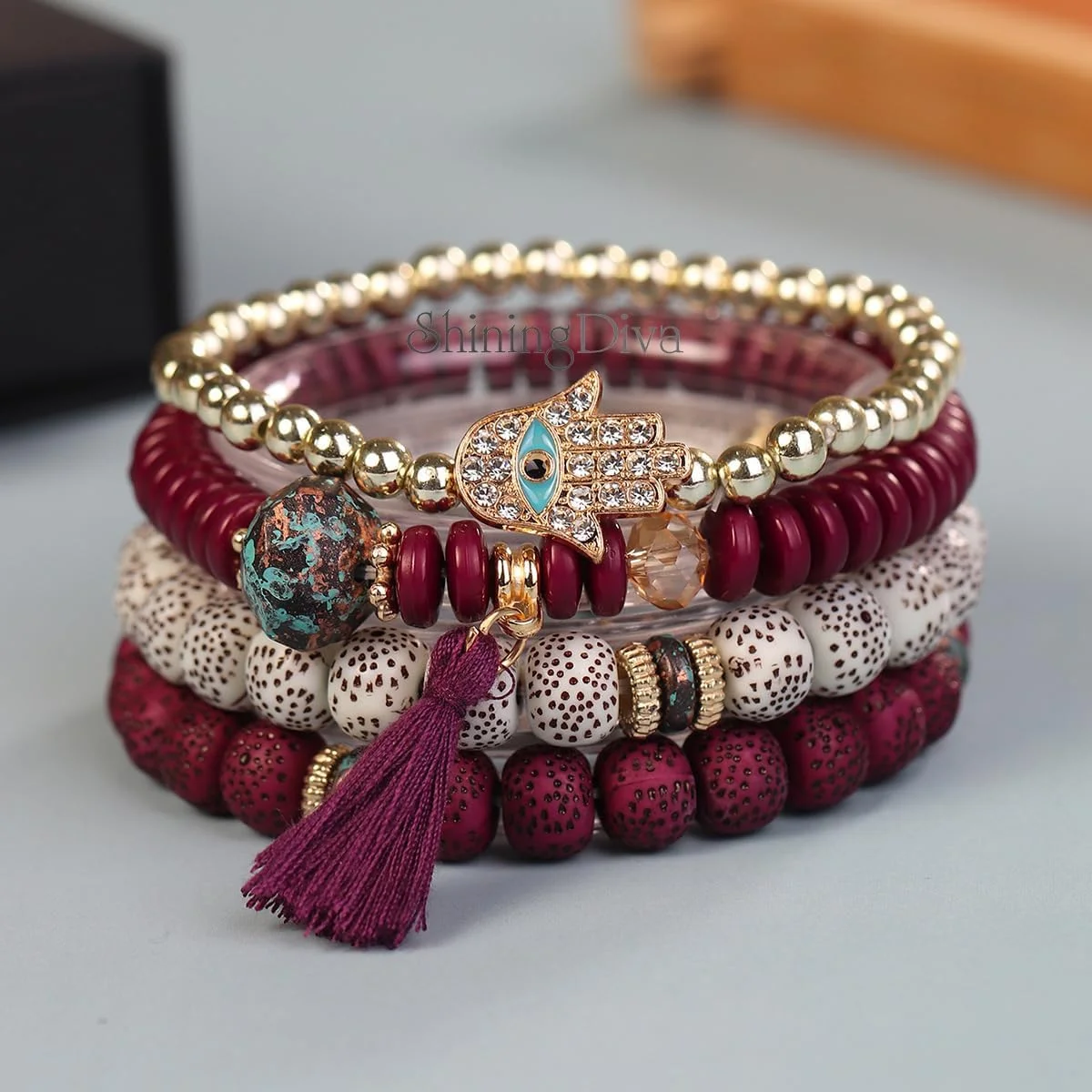 دستبند النگویی شیک و جدید طرح چشم نظر بوهمی براق دیوا فشن برای زنان و دختران (rrsd15427b) (زرشکی)