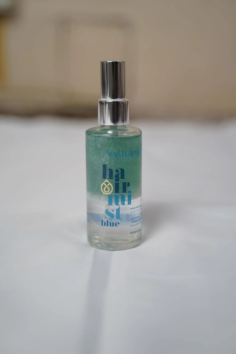 اسپری مو آبی - عطر مو - اسپری مو درخشان دوفاز - ضد وز - درخشش شدید - طراوت ماندگار - برای انواع مو - 60 میلی لیتر