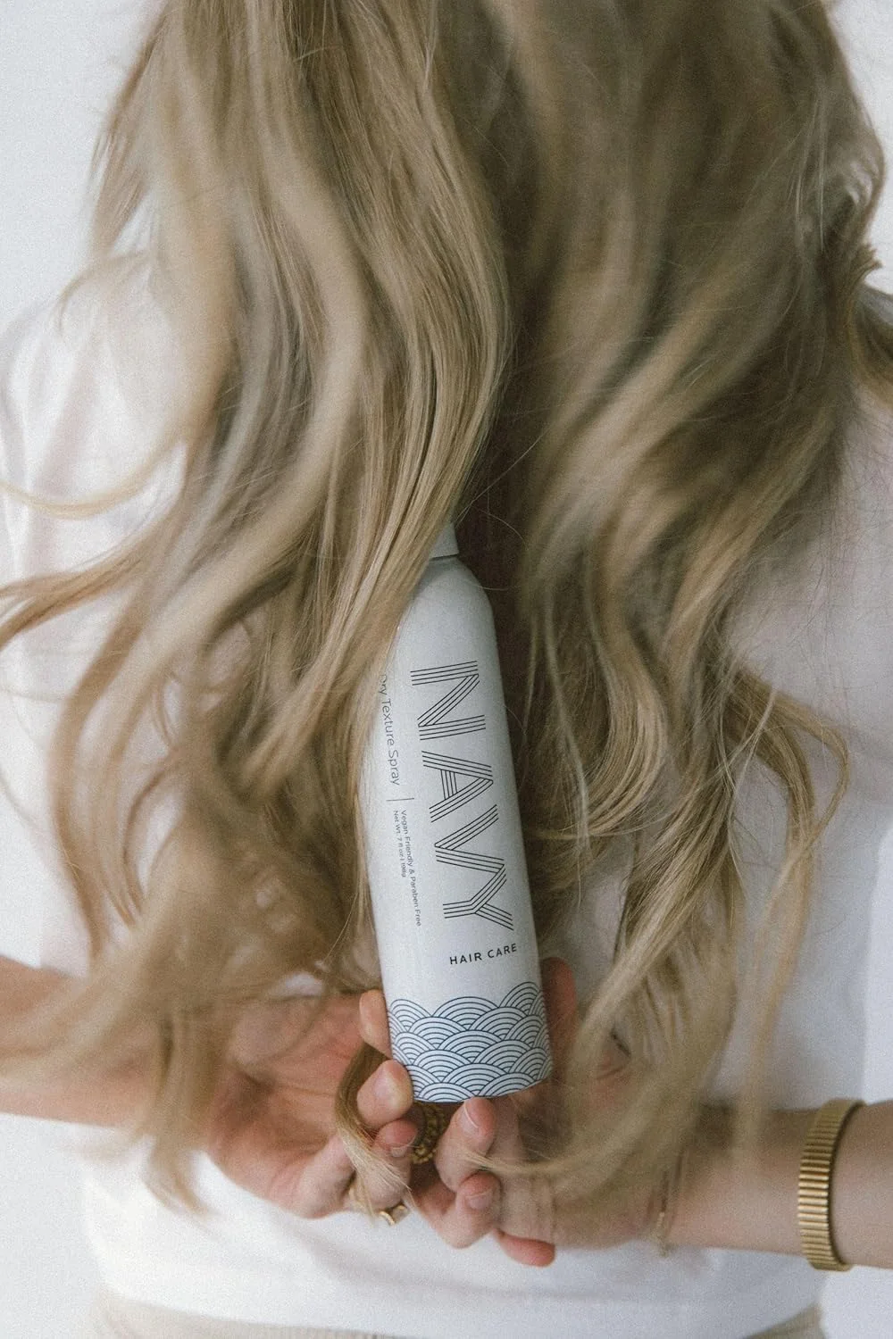 اسپری بافت دهنده موی خشک نیوی هیر کر مدل Pebble Beach