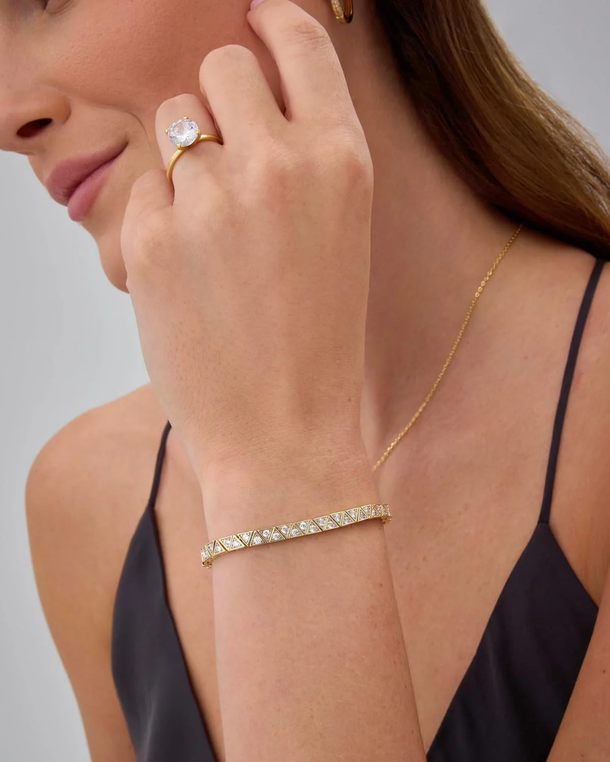 دستبند تنیس زنانه پاوی با روکش طلای 14 و 18 عیار و نگین های اتمی - دستبند طلایی با نگین های زیرکونیا، برش تریلیون، برش رادیانت، گرد، گلابی و قلبی - سایزهای مختلف