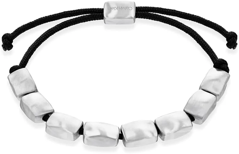 دستبند مردانه کالوین کلاین مدل CK METALLIC WAVES از جنس استیل ضد زنگ با روکش یونی GunMetal