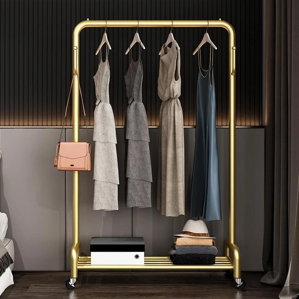 ریل لباس چرخ دار با قلاب و قفسه ذخیره سازی، رخت آویز لباس ایستاده با چرخ، سازمان دهنده لباس برای اتاق خواب، اتاق لباسشویی (رنگ: طلایی، سایز: 100x40x130cm)
