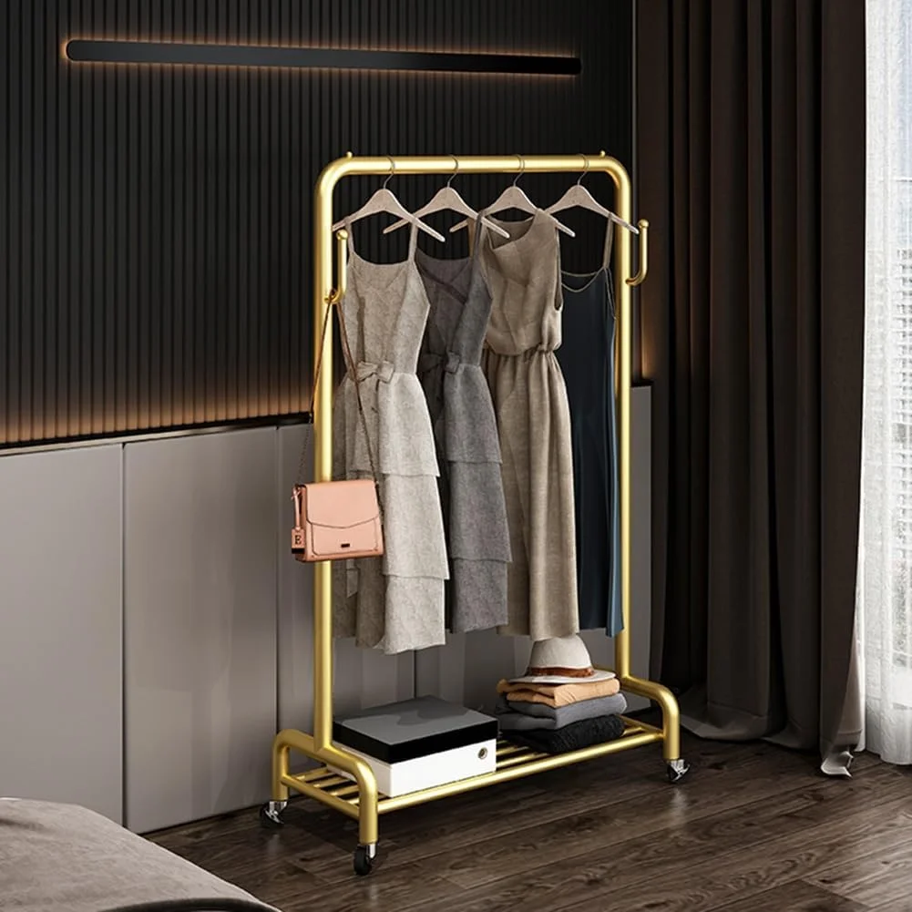 ریل لباس چرخ دار با قلاب و قفسه ذخیره سازی، رخت آویز لباس ایستاده با چرخ، سازمان دهنده لباس برای اتاق خواب، اتاق لباسشویی (رنگ: طلایی، سایز: 100x40x130cm)