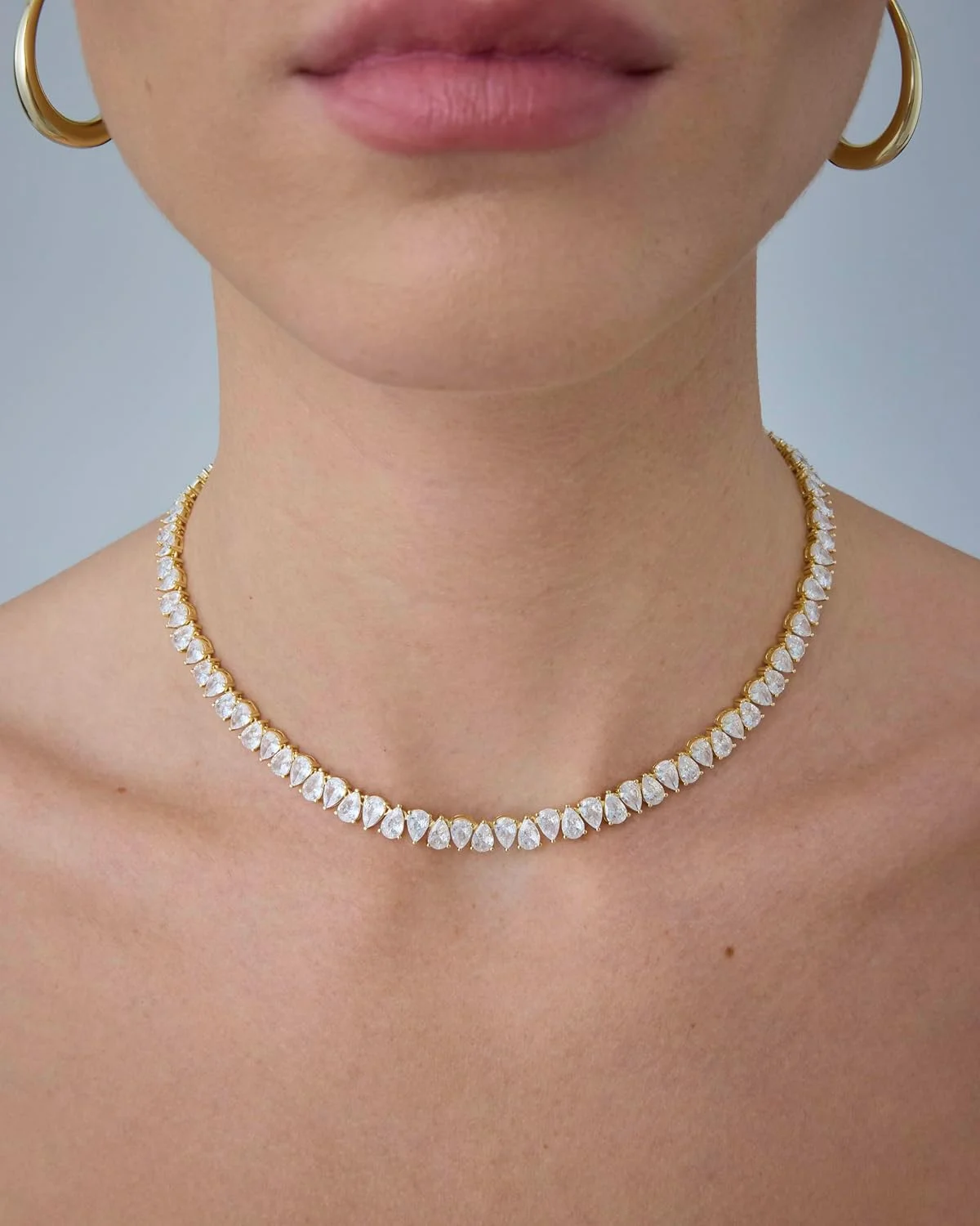 گردنبند تنیس زنانه با روکش طلای 14 عیار و زیرکونیا مکعبی گلابی شکل پاوی | گردنبند زنجیره ای تنیس | سایزهای 38 و 45 سانتی متر