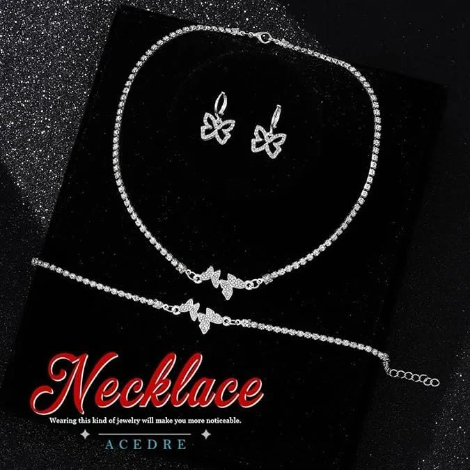 ست جواهرات پروانه ای نگین دار - گردنبند، دستبند و گوشواره های کریستالی نقره ای درخشان برای زنان - جواهرات ظریف، زیبا و درخشان با طراحی خیره کننده (3 تکه) ست جواهرات پروانه ای نگین دار - گردنبند، دستبند و گوشواره های کریستالی نقره ای درخشان برای زنان - جواهرات ظریف، زیبا و درخشان با طراحی خیره کننده (3 تکه)