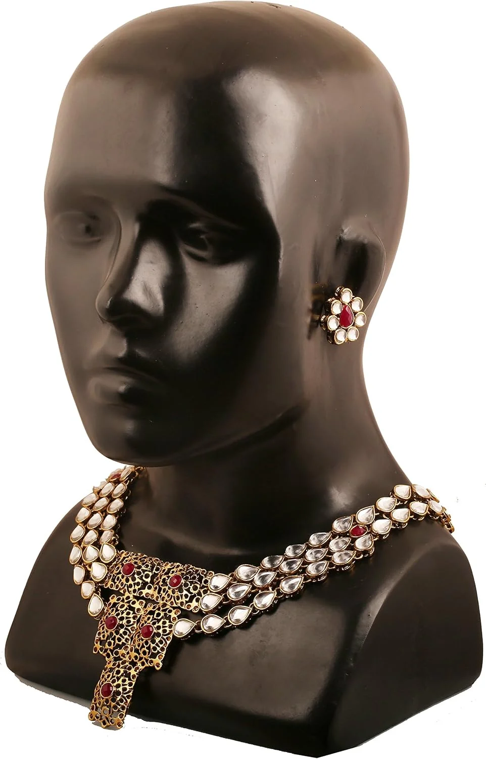 تاچ استون "مجموعه جالی مغول" جواهرات مجلل و افسانهای بالیوودی الهام گرفته از دوره باشکوه مغول، شامل سنگ های کندان پولکی و یاقوت مصنوعی، ست گردنبند بلند رانی هار، طراحی شده برای عروس، با رنگ طلایی عتیقه، مخصوص بانوان. تاچ استون "مجموعه جالی مغول" جواهرات مجلل و افسانهای بالیوودی الهام گرفته از دوره باشکوه مغول، شامل سنگ های کندان پولکی و یاقوت مصنوعی، ست گردنبند بلند رانی هار، طراحی شده برای عروس، با رنگ طلایی عتیقه، مخصوص بانوان.