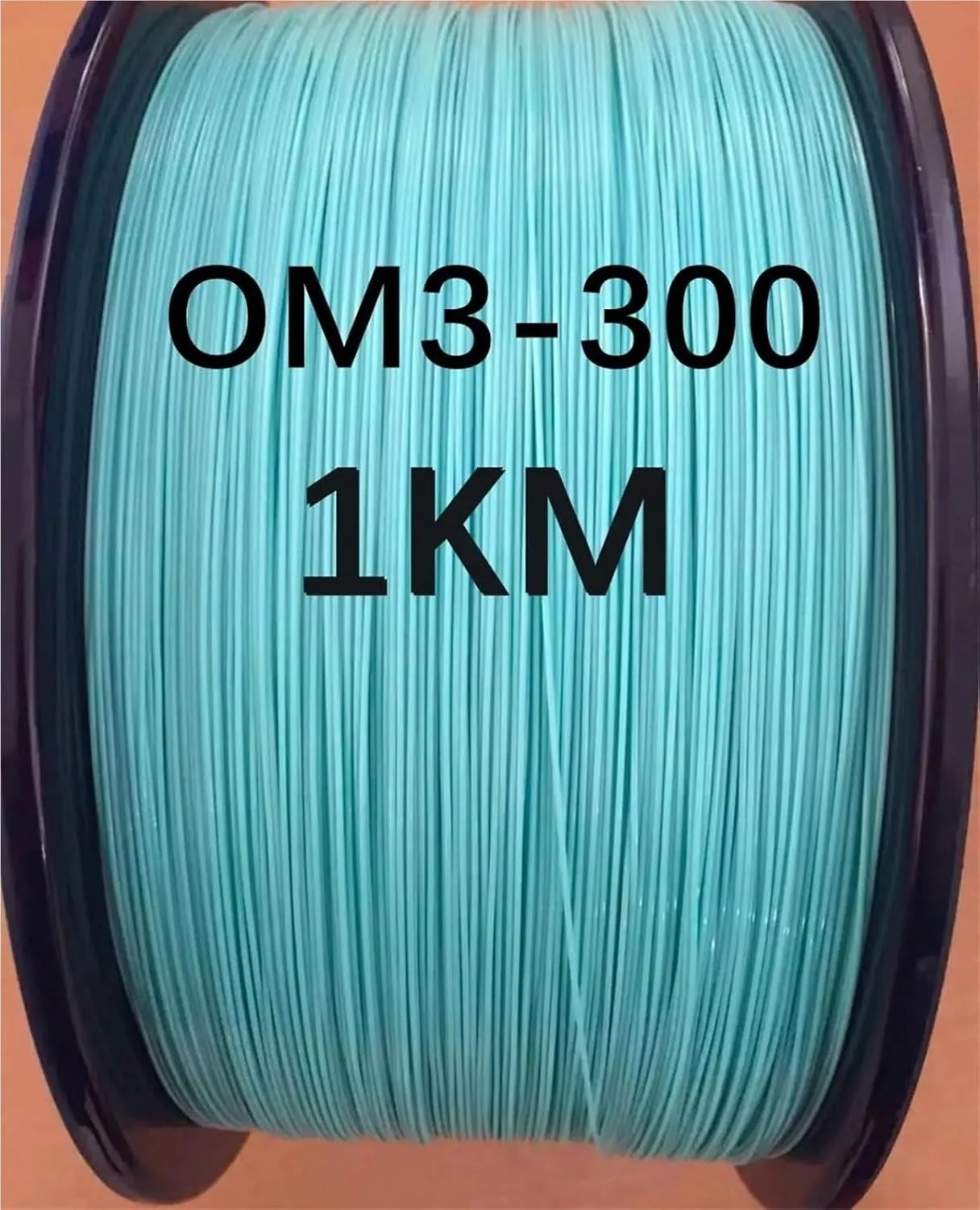 کابل فیبر نوری تایت 0.9 میلی‌متری OM3-300 مالتی مود رنگی برای پیگتیل‌های فیبر نوری FTTH، کابل فیبر نوری 1 کیلومتر/حلقه 1000 متر