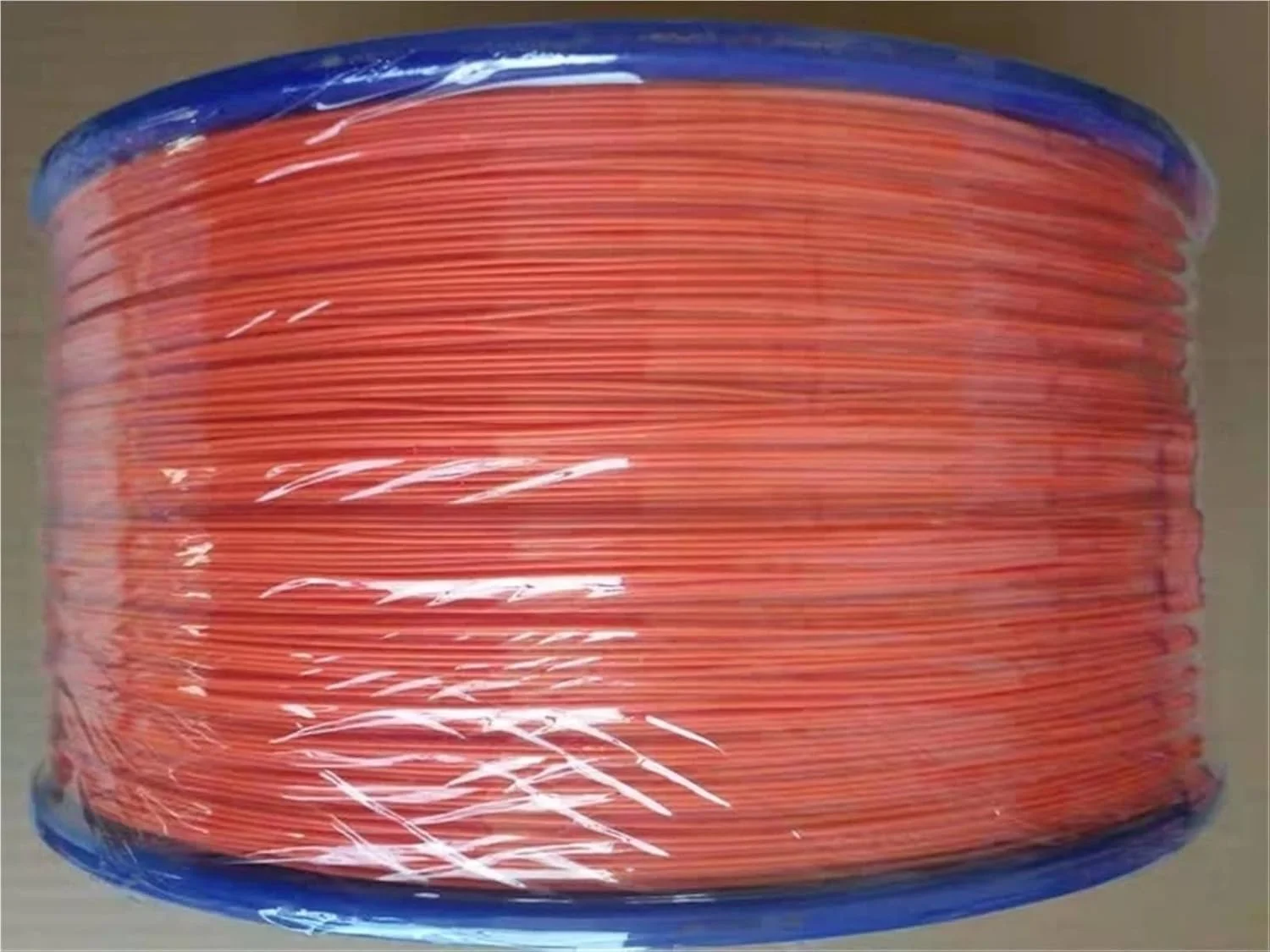 کابل فیبر نوری تایتد 0.9 میلی‌متری چند حالته نارنجی 50/125um 62.5/125um برای کابل فیبر نوری FTTH، 2.5 کیلومتر در هر رول 2500 متر (50-125um)