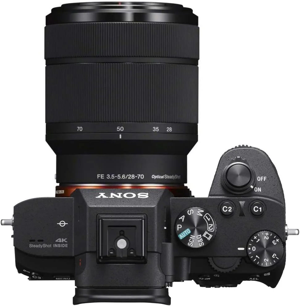دوربین بدون آینه فول فریم سونی a7III با لنز FE 28-70mm F3.5-5.6 OSS، به همراه مجموعه لنز تله فوتو و واید انگل، 2 عدد کارت حافظه 64 گیگابایتی، کیف Deco Gear و لوازم جانبی (26 قطعه)