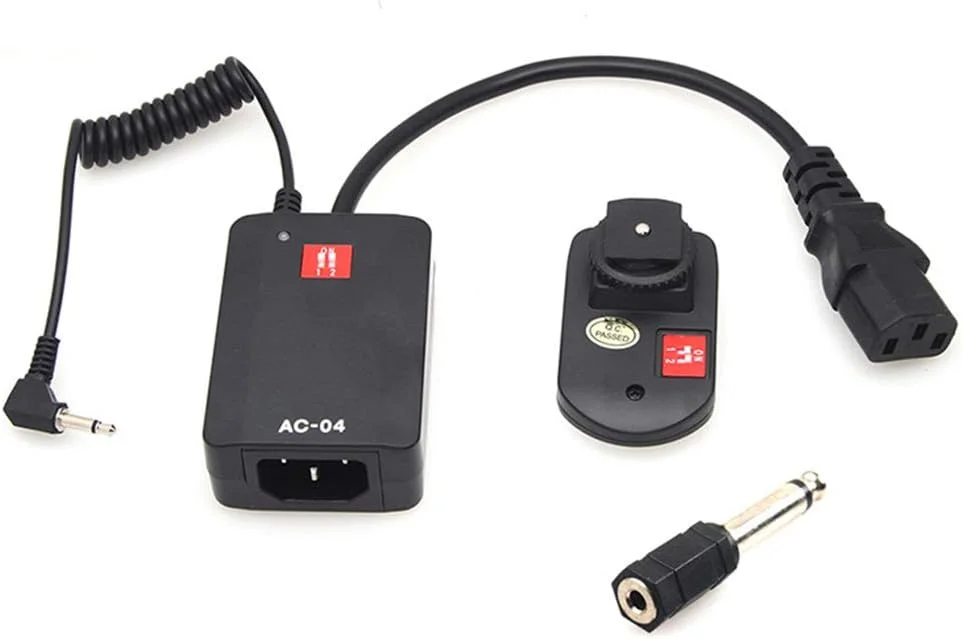 سیستم فعالساز بیسیم با فرستنده و گیرنده 4 کاناله با آداپتور 3.5 میلیمتری به 6.35 میلیمتری برای نور فلاش استودیوی عکاسی سیستم فعالساز بیسیم با فرستنده و گیرنده 4 کاناله با آداپتور 3.5 میلیمتری به 6.35 میلیمتری برای نور فلاش استودیوی عکاسی