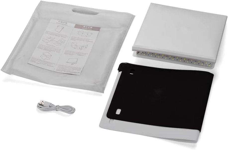 لایت باکس استودیویی LED قابل حمل و تاشو Labymos 6000K با پس زمینه های سیاه و سفید و منبع تغذیه USB برای عکاسی از جواهرات، ساعت و محصولات کوچک لایت باکس استودیویی LED قابل حمل و تاشو Labymos 6000K با پس زمینه های سیاه و سفید و منبع تغذیه USB برای عکاسی از جواهرات، ساعت و محصولات کوچک