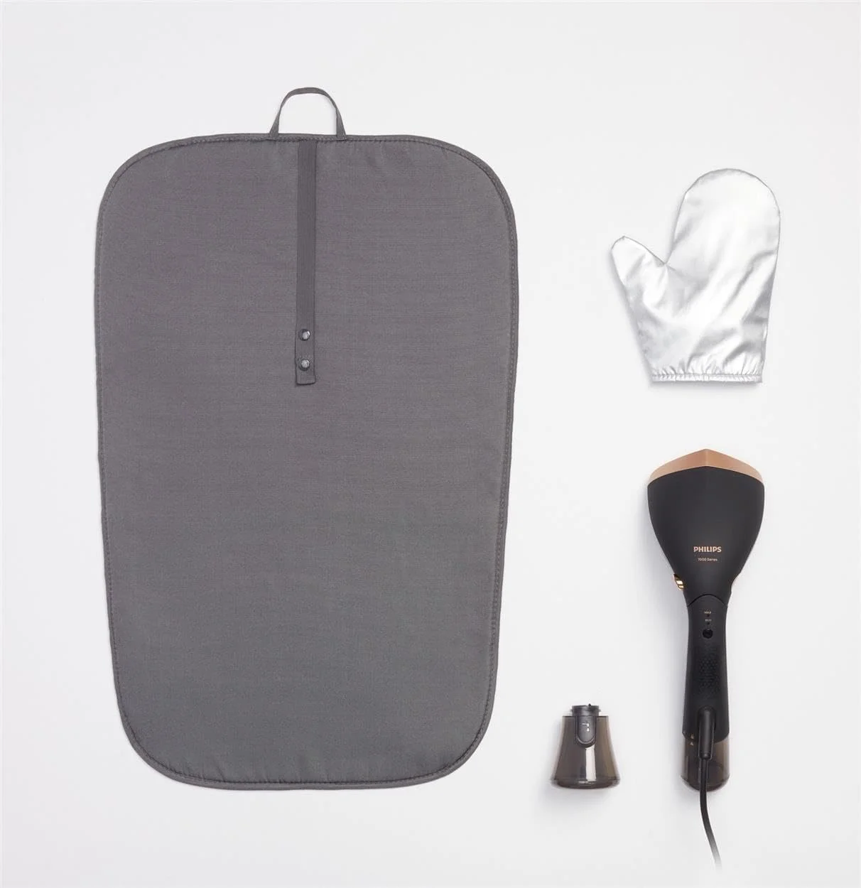 بخارگر دستی سری 7000 فیلیپس Versuni - 1500 وات، 28 گرم در دقیقه بخار مداوم. دمای مطلوب. صفحه فلزی، مخزن جداشدنی 100 میلی لیتری. دارای کیف مسافرتی، آبی عمیق (STH7020/20)