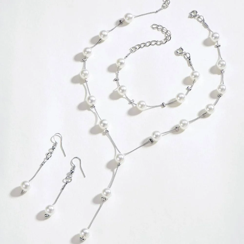 ست جواهرات زنانه شامل گردنبند، گوشواره و دستبند مرواریدی با طراحی شیک و جدید - روکش نقره ست جواهرات زنانه شامل گردنبند، گوشواره و دستبند مرواریدی با طراحی شیک و جدید - روکش نقره