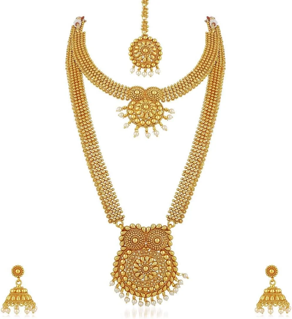 ست جواهرات گوشواره و گردنبند بلند طلایی رنگ به سبک سنتی بالیوود، مناسب برای مجالس عروسی و مهمانی، با طراحی قومی و مد روز برای بانوان