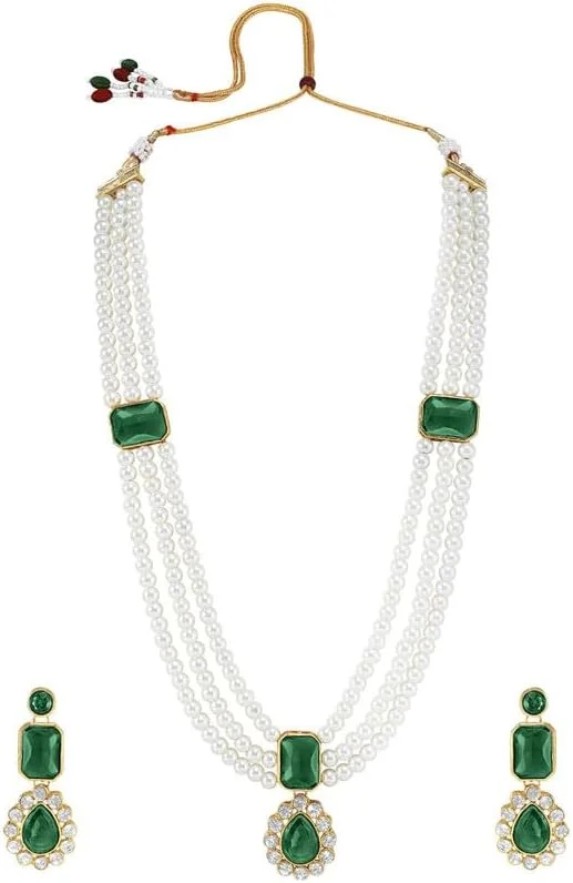 ست جواهرات سنتی هندی زنانه شامل گردنبند بلند و گوشواره با روکش طلایی و نگین های سبز رنگ ست جواهرات سنتی هندی زنانه شامل گردنبند بلند و گوشواره با روکش طلایی و نگین های سبز رنگ