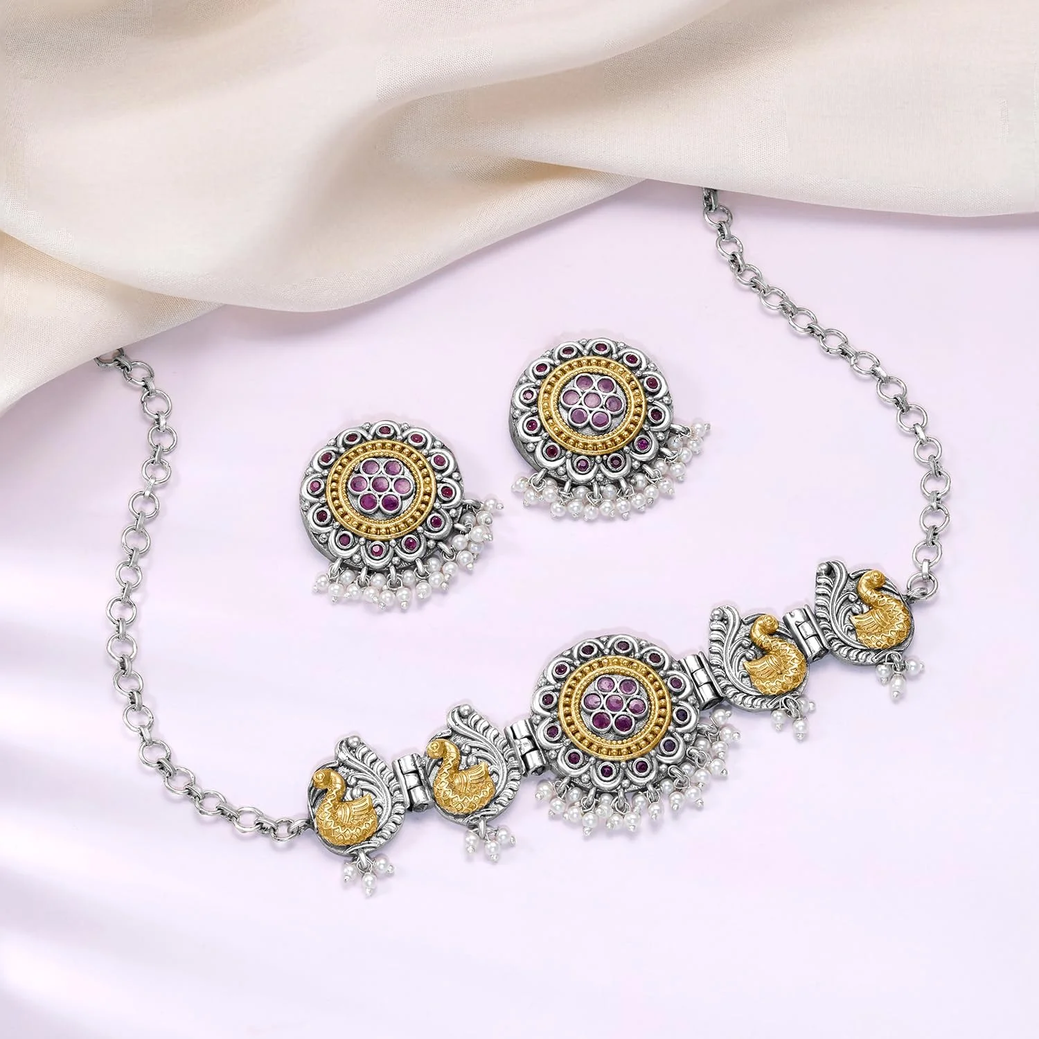 ست گوشواره و گردنبند زنانه طرح نقره ای و طلایی با نگین های یاقوت مصنوعی و لاریه ست گوشواره و گردنبند زنانه طرح نقره ای و طلایی با نگین های یاقوت مصنوعی و لاریه