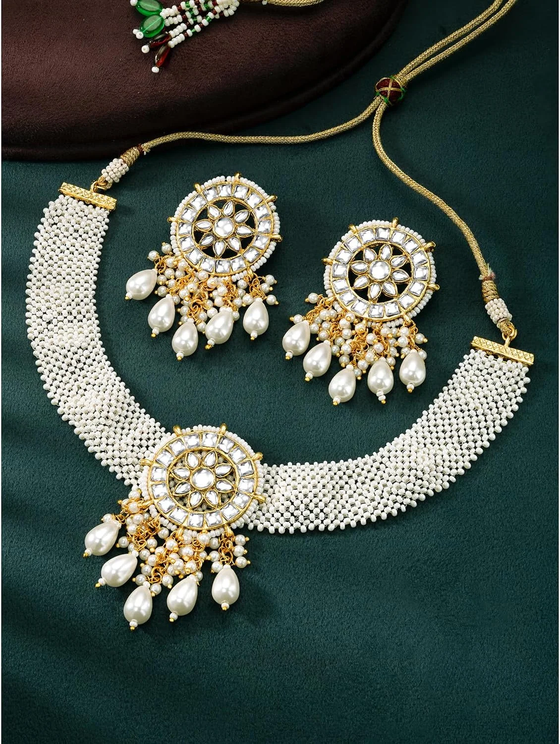 آهلی، ست زیورآلات زنانه شامل گردنبند و گوشواره آویز با روکش طلایی، مزین به نگین های سفید و مهره آهلی، ست زیورآلات زنانه شامل گردنبند و گوشواره آویز با روکش طلایی، مزین به نگین های سفید و مهره