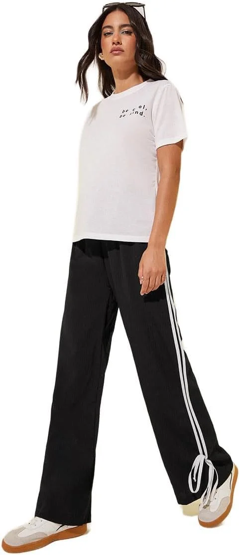 شلوار زنانه استایلی مدل 7016953101 با جزئیات گره پروانه‌ای و پاچه گشاد