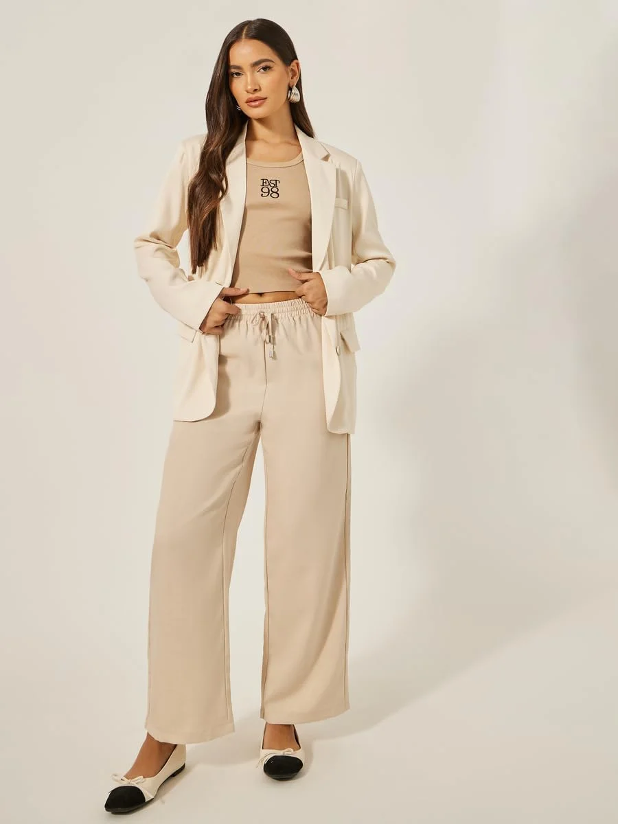 شلوار زنانه استایلی با فاق متوسط و پاچه گشاد به همراه بند