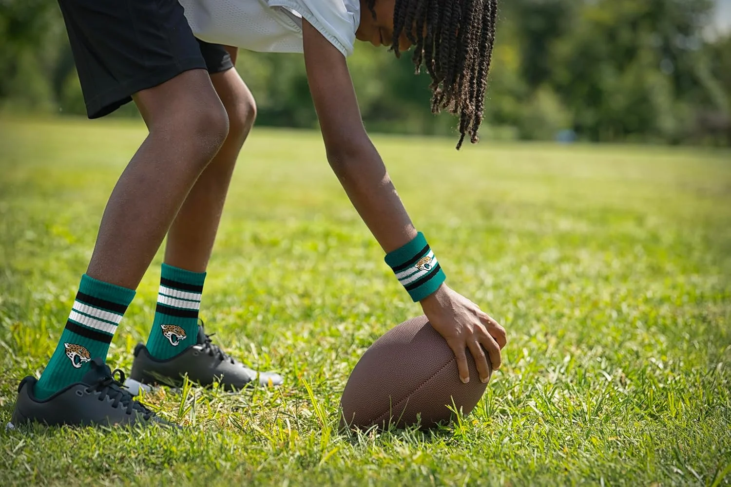 هدبند و مچ بند طرح لوگوی تیم جکسونویل جگوارز (NFL) با رنگ تیمی